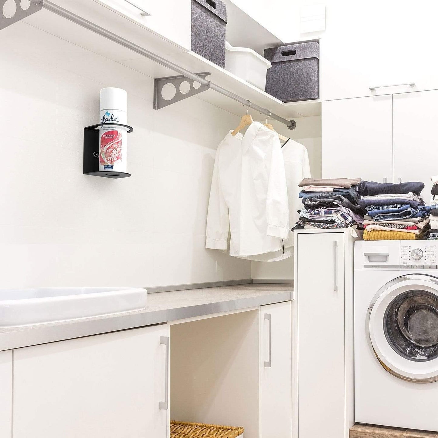 Mount your spray cans on the wall for quick and easy access in your laundry room